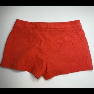 Trina Turk shorts. Size 8. Orange/coral color